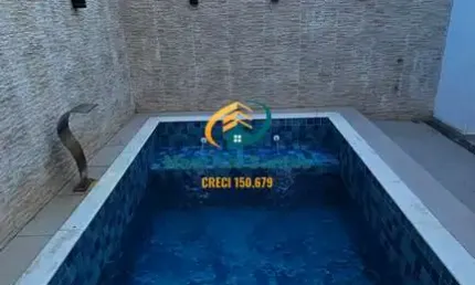 Sobrado Geminado em Mongaguá, bairro Jardim Aguapeú, Novo e com 3 suítes, lavabos e demais dependências, churrasqueira e piscina privativas!!