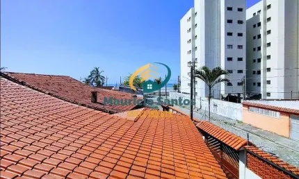Sobrado em Mongaguá, bairro Oceanópolis, a 50 metros do mar, 4 suítes e demais dependências, sacada com vista para o mar, churrasqueira, portão eletrônico.