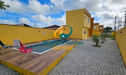 Sobrado em Condomínio em Itanhaém, bairro Santa Terezinha, próximo a praia, 2 suítes, lavabo, lavanderia e churrasqueira, Residencial com piscina com cascata!!