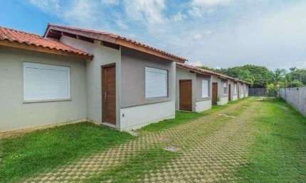 Casa com 2 dormitórios para alugar, 47 m² por R$ 1.340/mês - Ponta Grossa - Port