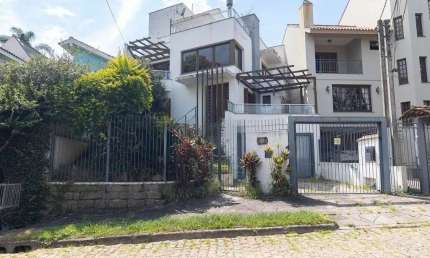 Casa com 5 dormitórios para alugar, 303 m² por R$ 7.974/mês - Ipanema - Porto Al