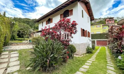 Casa com 4 dormitórios à venda, 187 m² por R$ 940.000,00 - Golfe - Teresópolis/RJ