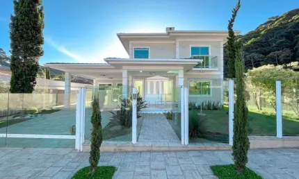 Casa com 4 dormitórios, 255 m² - venda por R$ 2.500.000,00 ou aluguel por R$ 10.751,72/mês - Prata - Teresópolis/RJ