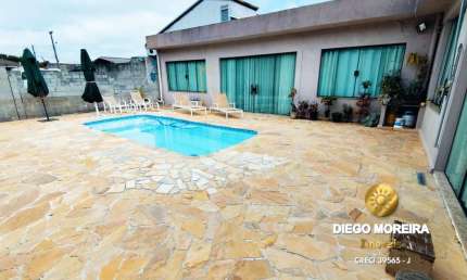 Casa à venda em Terra Preta - Espaço, Lazer e Potencial de Expansão!