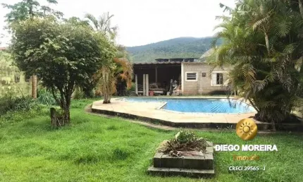 Chácara á venda em Terra Preta com 3 dormitórios - 500 m²