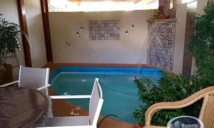 Casa com 4 dormitórios à venda, 320 m² por R$ 1.350.000,00 - Ribeirânia - Ribeirão Preto/SP