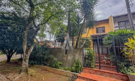Casa em condomínio fechado com 3 quartos à venda na Rua das Hortências, --, São Marcos, Joinville por R$ 1.200.000