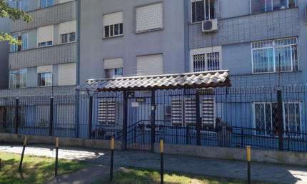 Ótimo apto térreo com 1dormitório, sala, cozinha, banheiro, área de serviços e estacionamento rotativo, dormitório com máveis sob medida , ar Split, cozinha com móveis sob medida, pia com tampo em gra