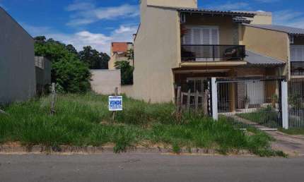 ótimo terreno com 08 x 25 ( 200m²) limpo, entre residencias de médio padrão,  com vista para o guaiba, documentação em dia.