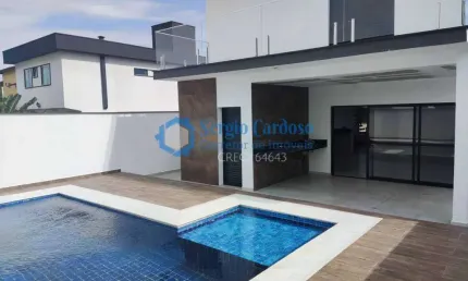 Sobrado 3 quartos 2 suítes  pé na areia  condominio alto padrão itanhaém sp