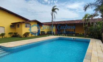 CASA PÉ NA AREIA COM TERRENO DE 910M²! 4 QUARTOS + EDÍCULA ITANHAÉM/SP