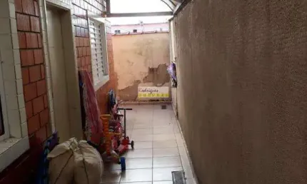 CASA EM CONDOMINIO FECHADO - 2 DORM E GARAGEM  - $ 210 MIL