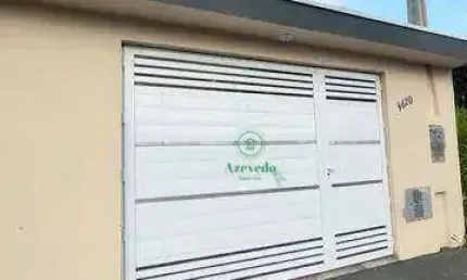 Casa com 2 dormitórios à venda, 79 m² por R$ 371.000,00 - Massaguaçu - Caraguatatuba/SP