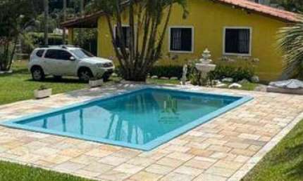 Casa com 4 dormitórios à venda, 215 m² por R$ 990.000,00 - Caputera - Arujá/SP