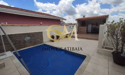 Casa com piscina em  atibaia, localizada no bairro alvinópolis.