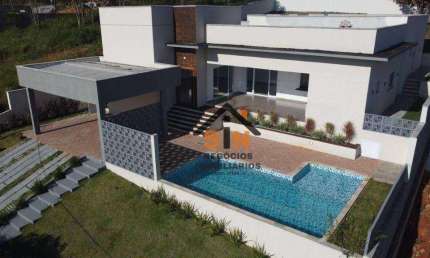 Casa com 4 dormitórios, 330 m² - venda por R$ 2.230.000,00 ou aluguel por R$ 13.100,00/mês - Condomínio Reserva Ibirapitanga - Santa Isabel/SP