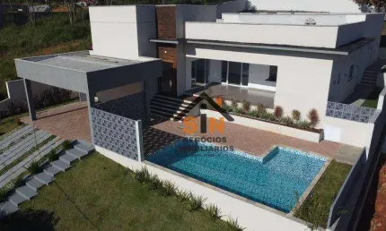 Casa com 4 dormitórios, 330 m² - venda por R$ 2.230.000,00 ou aluguel por R$ 13.100,00/mês - Condomínio Reserva Ibirapitanga - Santa Isabel/SP