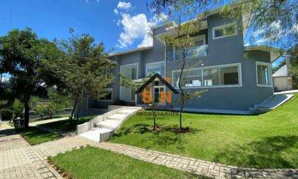 Sobrado com 4 dormitórios à venda, 430 m² por R$ 2.200.000,00 - Condomínio Reserva Ibirapitanga - Santa Isabel/SP