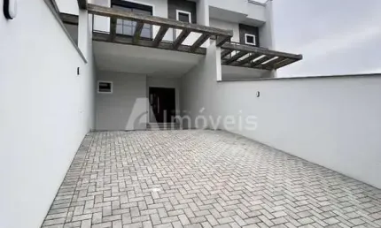 Geminado novo de 3 quartos com amplo quintal e 4 vagas de garagem