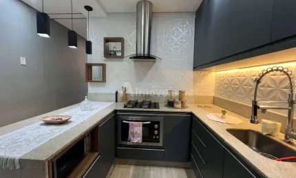 Seu cantinho perfeito em rua tranquila: 2 quartos e 2 vagas!