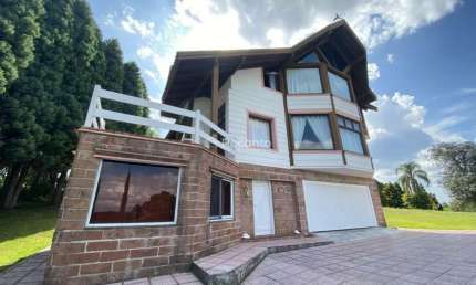 CASA DE 4 DORMITÓRIOS A VENDA EM CONDOMINIO, Golf Club, Gramado - RS