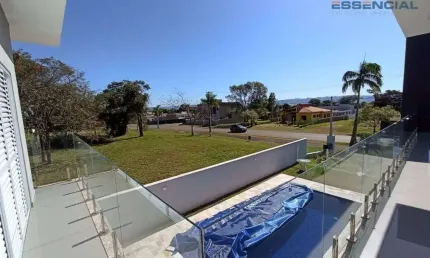 Casa com 4 dormitórios à venda, 244 m² por R$ 1.490.000,00 - Condomínio Ninho Verde II - Pardinho/SP