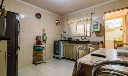Vendo casa com 3 dormitórios 2 vagas de garagem Americanopolis SP