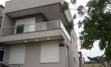 Casa em condomínio fechado com 3 quartos à venda na Rua Silvino Nedel, 240, Alto Petrópolis, Porto Alegre por R$ 960.000