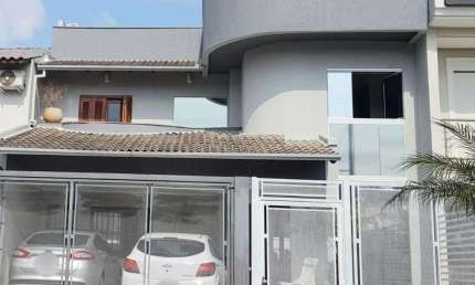 Casa em condomínio fechado com 4 quartos à venda na Rua Ângelo Raphael Frizzo, 95, Alto Petrópolis, Porto Alegre, 216 m2 por R$ 940.000