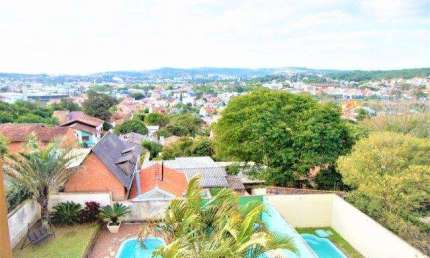 Casa com 3 quartos à venda na Rua dos Caiaguais, 118, Espírito Santo, Porto Alegre, 220 m2 por R$ 829.000