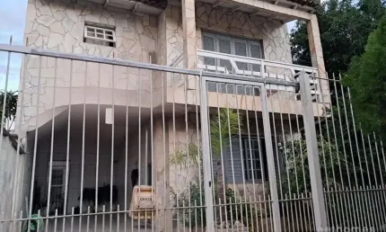 Casa com 3 quartos à venda na Rua Integração, 52, Jardim Algarve, Alvorada, 215 m2 por R$ 460.000