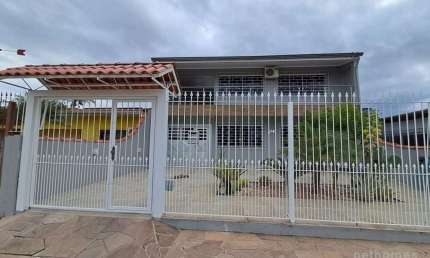 Casa com 3 quartos à venda na Rua Gaspar Martins, 894, Americana, Alvorada, 186 m2 por R$ 550.000