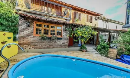 Casa em condomínio fechado com 4 quartos à venda na das Figueiras, 108, Santa Tereza, Porto Alegre, 200 m2 por R$ 650.000