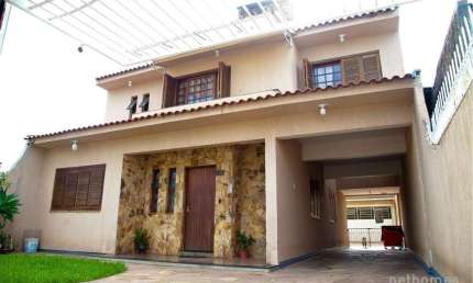 Casa com 3 quartos à venda na Rua Princesa Isabel, 735, Sumaré, Alvorada, 300 m2 por R$ 679.900