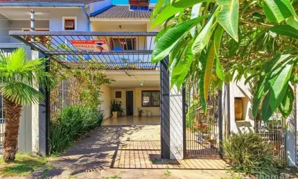 Casa com 4 quartos à venda na Rua Claudio da Silva Pinto, 287, Espírito Santo, Porto Alegre, 201 m2 por R$ 599.000
