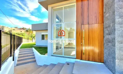 Casa PLANA com 3 dormitórios à venda no bairro Metzler em Campo Bom/RS.