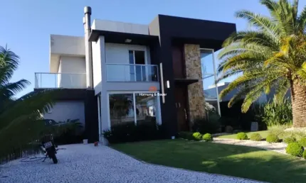 Casa mobiliada à venda no centro de xangri-lá - condomínio quintas do lago