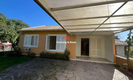 Casa à venda em Novo Hamburgo, Vila Nova - Com churrasqueira, suíte e pátio