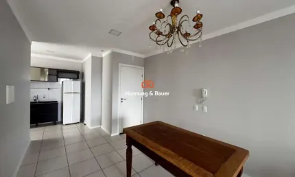 Apartamento semimobiliado com suíte à venda em Torres!