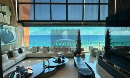 Linda Cobertura, 374 m², com incrível vista mar, living com pé direito duplo e duas varandas.