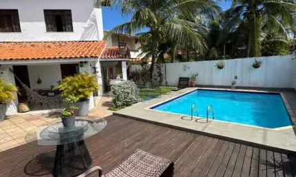Casa 5/4 em Vilas do Atlântico - Lauro de Freitas-BA: 370m², 3 suítes, piscina, área gourmet, sauna e academia!