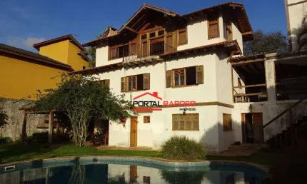 Casa com 3 dormitórios à venda, 356 m² por R$ 1.595.000,00 - Granja Viana - Carapicuíba/SP
