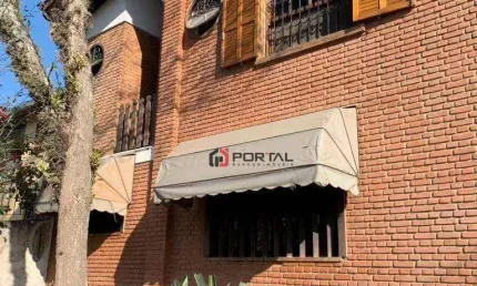Casa com 4 dormitórios à venda, 254 m² por R$ 1.000.000,00 - Granja Viana - Embu das Artes/SP