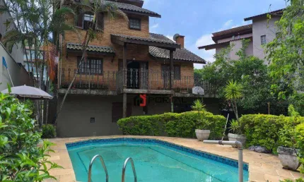 Casa com 4 dormitórios, 404 m² - venda por R$ 1.200.000,00 ou aluguel por R$ 8.500,00/mês - Granja Viana - Jandira/SP