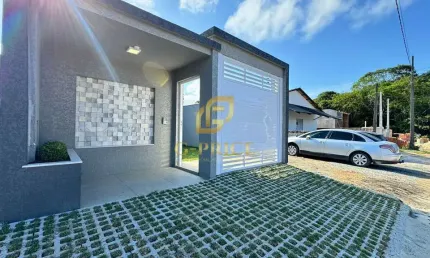 Belíssima casa nova de alto padrão com pé direito alto na região central da cidade