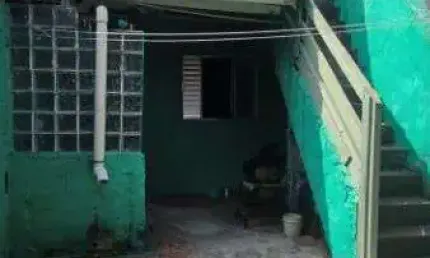 Otima terreno com 3 casas ao lado do terminal cid. tiradentes