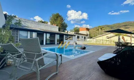 Casa com 3 dormitórios à venda, 303 m² por R$ 3.500.000,00 - Condomínio Flamboyant - Atibaia/SP