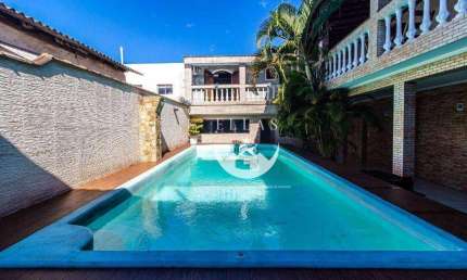 Sobrado com 2 dormitórios à venda, 250 m² por R$ 740.940,00 - Areia Branca - Santos/SP