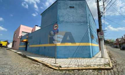 Prédio Comercial; próximo ao centro de Suzano; com 8 salas; refeitório; pátio; banheiros.