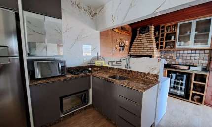 Linda casa geminada à venda, com piscina, hidromassagem e churrasqueira na Barra do Aririú - Palhoç